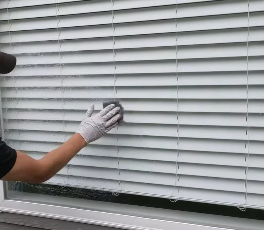 Cleaning hard water stain on windows in San Clemente